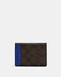 COACH®,MAGNETIC CARD CASE IN COLORBLOCK SIGNATURE CANVAS WITH COACH PATCH,Leather,Mini,QB/Charcoal/Sport Blue Multi,Back View