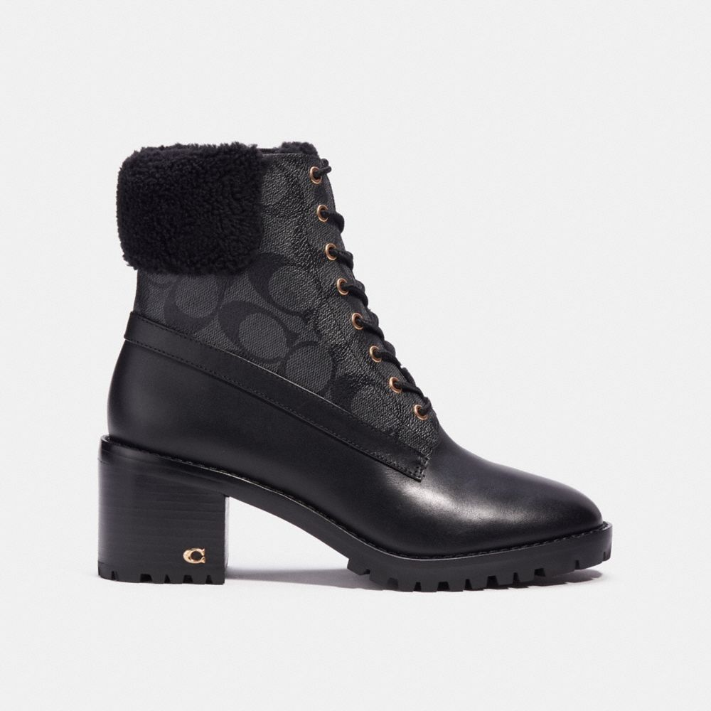 Coach boots black sale