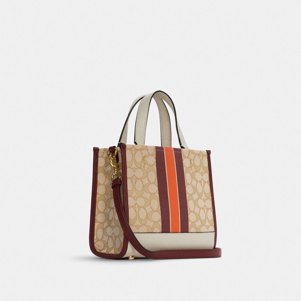 COACH®,Dempsey Tote Bag 22 In Signature Jacquard With Stripe And Coach Patch,,Angle View