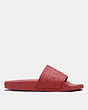 COACH®,SIGNATURE POOL SLIDE,Rubber,Brick Red,Angle View