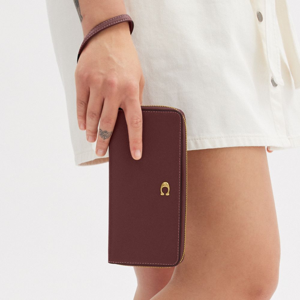 COACH®,Continental Wallet,Leather,Bi Fold,Wristlet,Continental,Logo,Metal,Scratch Resistant,Gold Metal,Casual,Maroon,Detail View