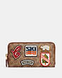 COACH®,ACCORDION ZIP WALLET IN SIGNATURE CANVAS WITH PATCHES,Brass/Tan/Rust,Front View