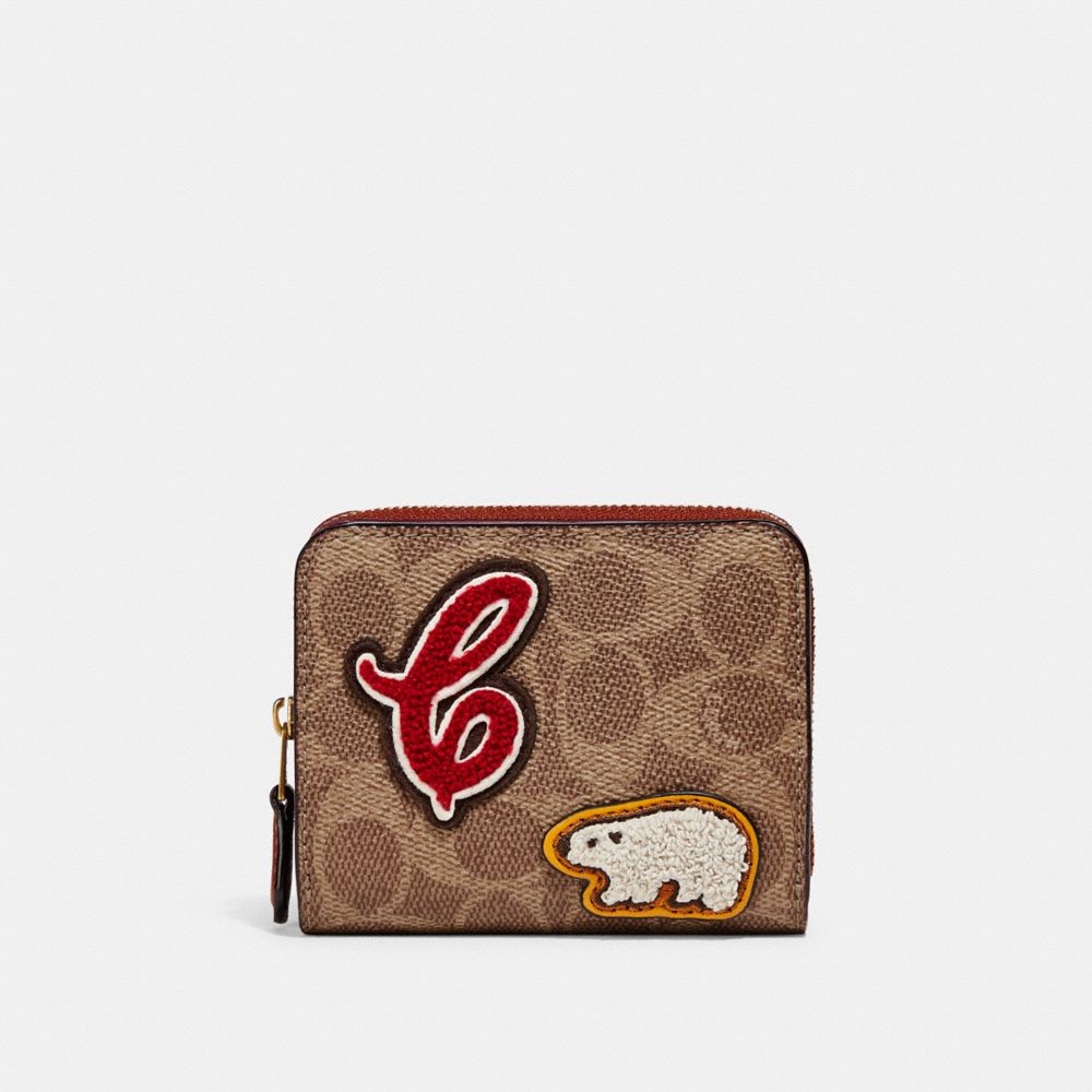 COACH® | Billfold Wallet In Signature Canvas With Patches