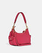 COACH®,PENNIE SHOULDER BAG 25,Mini,Gold/Bold Pink,Angle View
