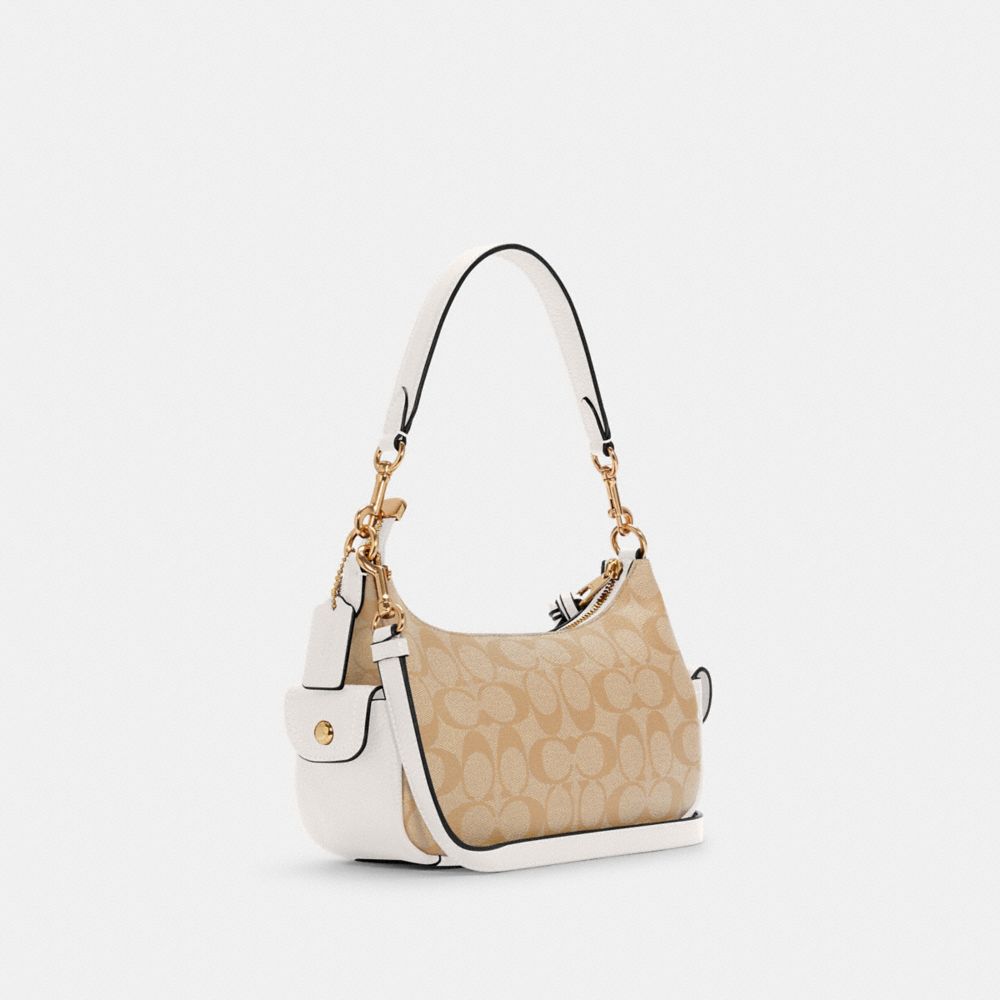 COACH OUTLET®  Pennie Shoulder Bag In Signature Canvas