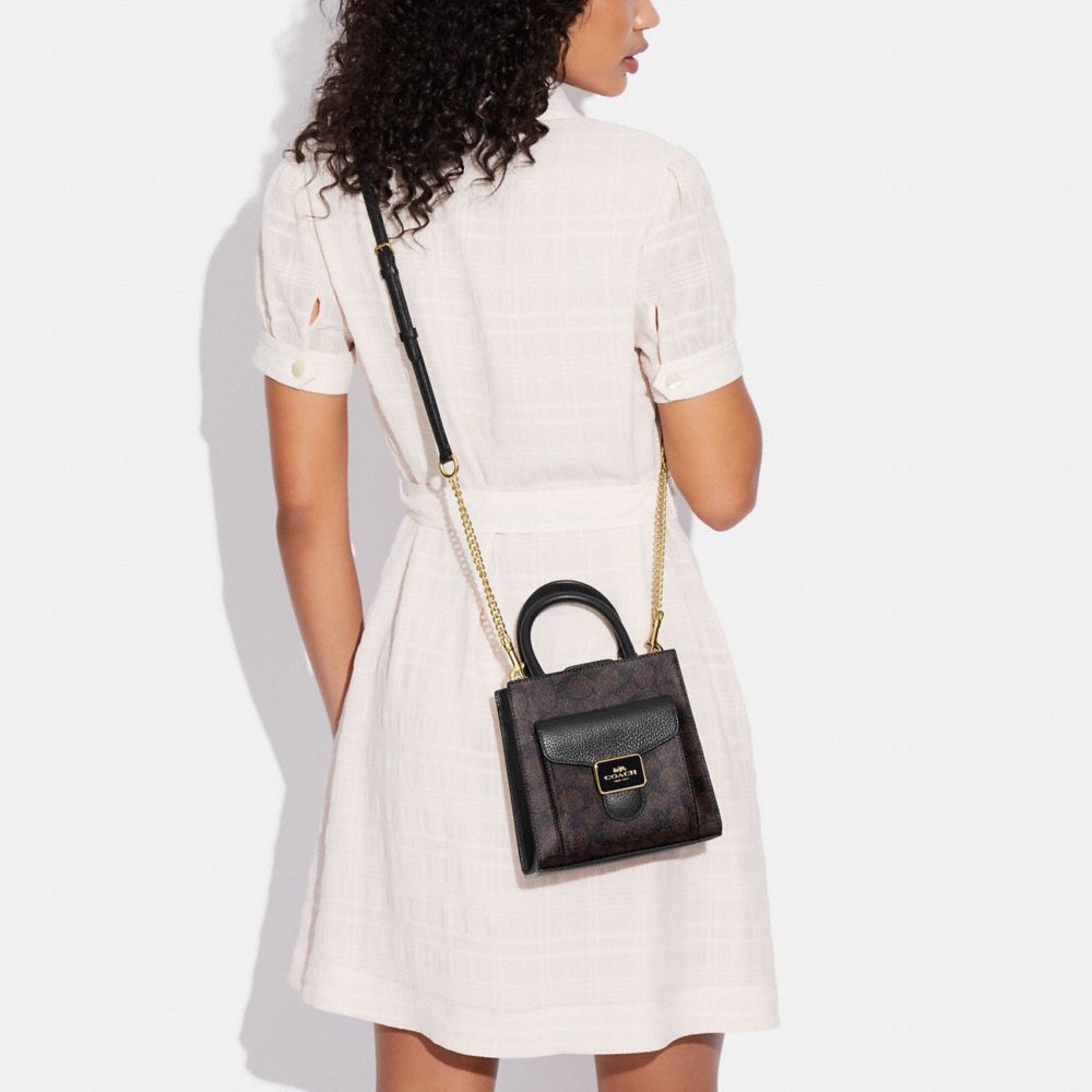 COACH®,Mini Pepper Crossbody In Signature Canvas,,Detail View