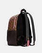 COACH®,COURT BACKPACK IN SIGNATURE CANVAS WITH DISCO STAR PRINT,Large,Gold/Khaki Multi,Angle View