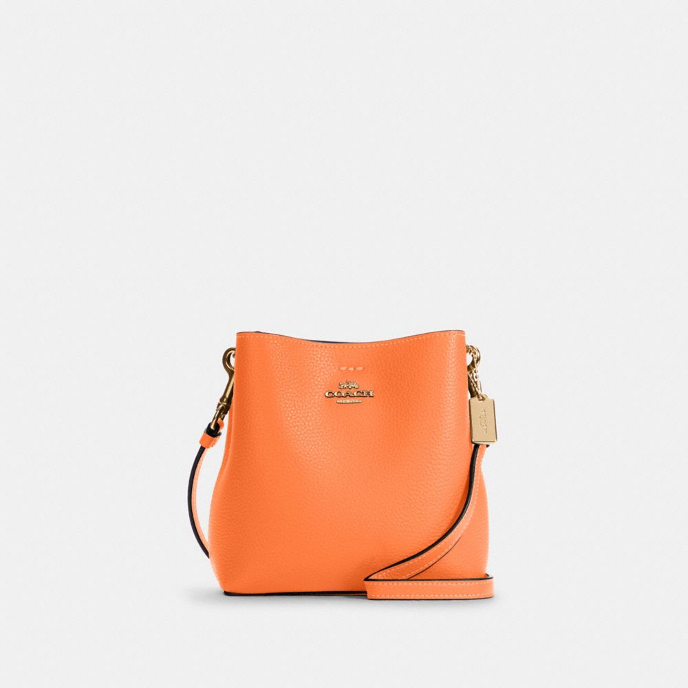 COACH®,MINI TOWN BUCKET BAG,Pebbled Leather,Small,Gold/Candied Orange,Front View