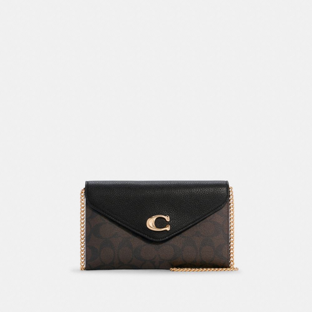 COACH®,Tammie Clutch Crossbody In Signature Canvas,,Front View