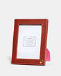 COACH®,PICTURE FRAME,Pebble Leather,Mini,Brass/Red Sand/Confetti Pink,Front View