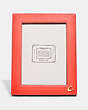 COACH®,PICTURE FRAME,Pebble Leather,Mini,Brass/Tangerine/Light Saddle,Angle View
