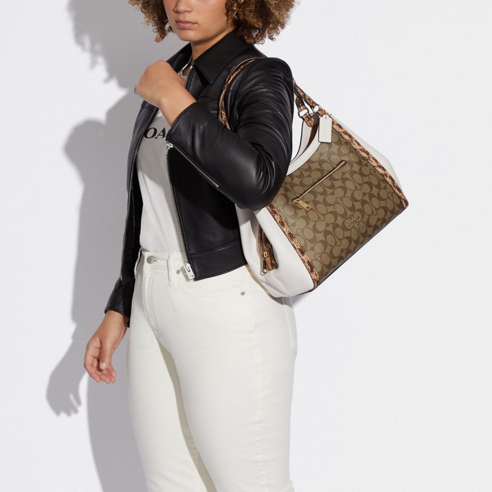 COACH OUTLET®  Kristy Shoulder Bag In Signature Canvas