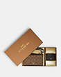 COACH®,BOXED ANNA FOLDOVER CLUTCH CROSSBODY AND CARD CASE SET IN BLOCKED SIGNATURE CANVAS,Signature Coated Canva...,Gold/Khaki Brown Multi,Front View