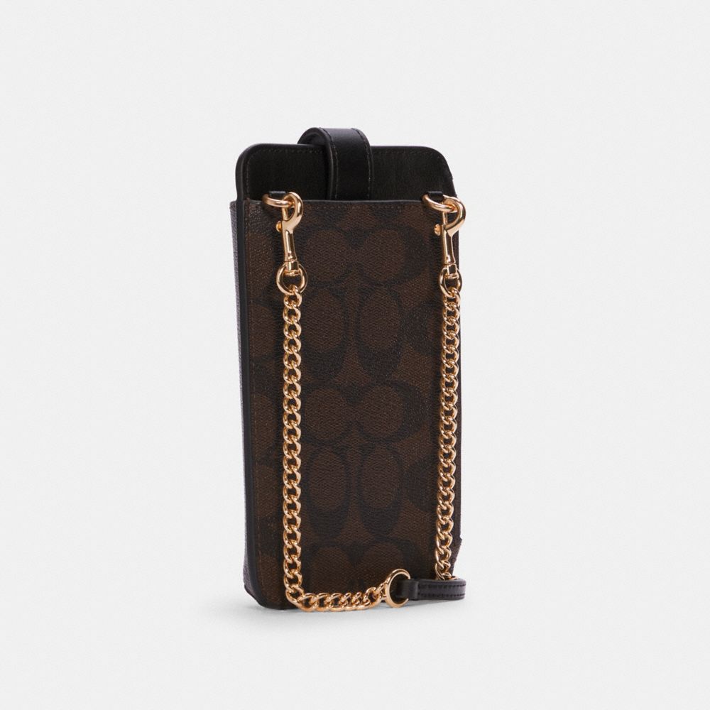 COACH®,Phone Crossbody In Signature Canvas,,Angle View