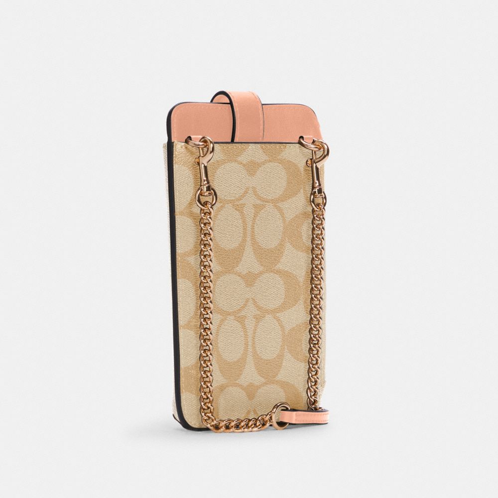 COACH®,Phone Crossbody In Signature Canvas,,Angle View