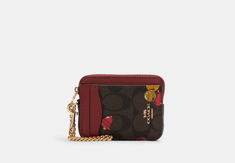 COACH®,ZIP CARD CASE IN SIGNATURE CANVAS WITH ORNAMENT PRINT,Gold/Brown Black Multi,Front View