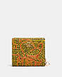 COACH®,DISNEY MICKEY MOUSE X KEITH HARING SNAP WALLET,Leather,Gold/Yellow/Red,Front View