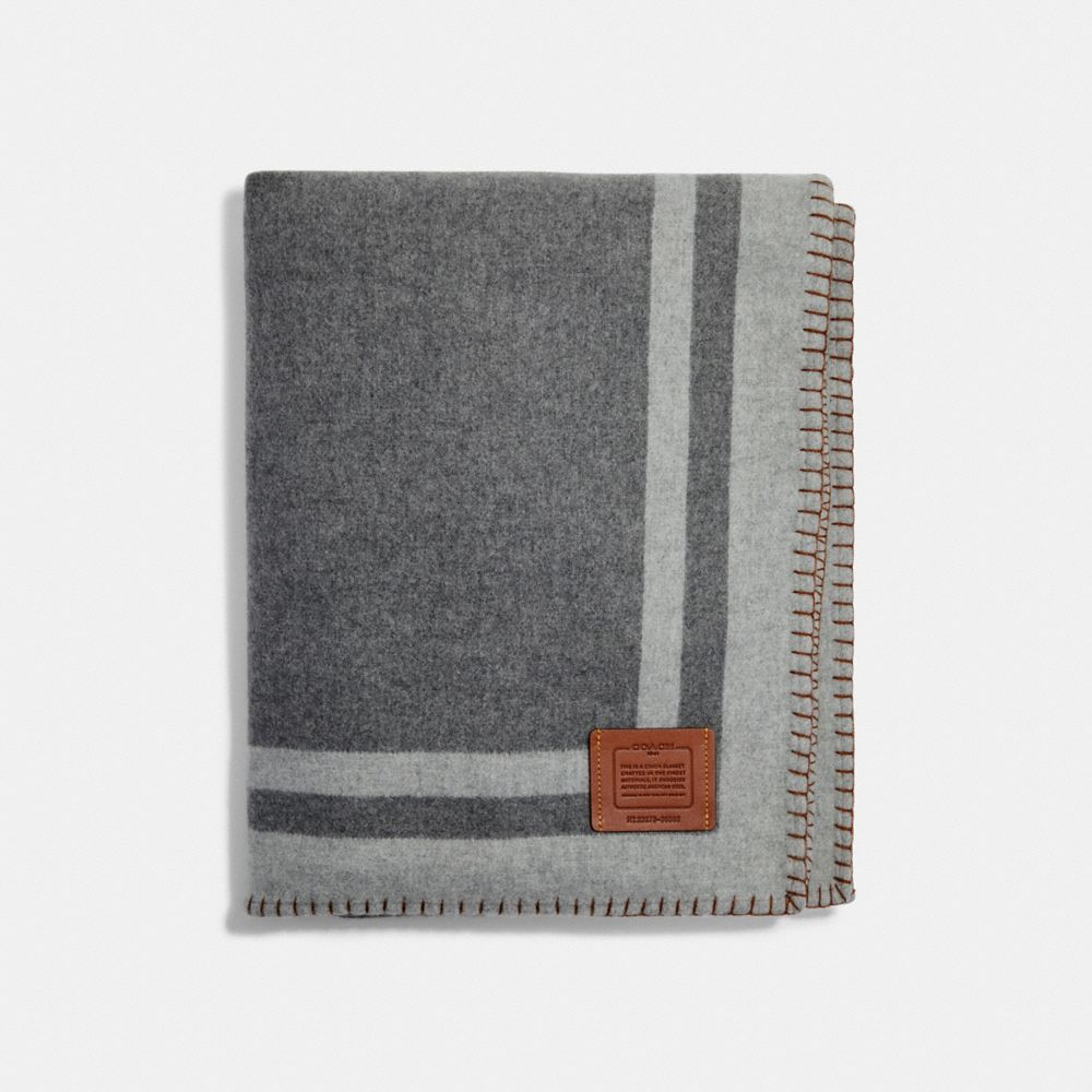 Complimentary Blanket With Coach Badge