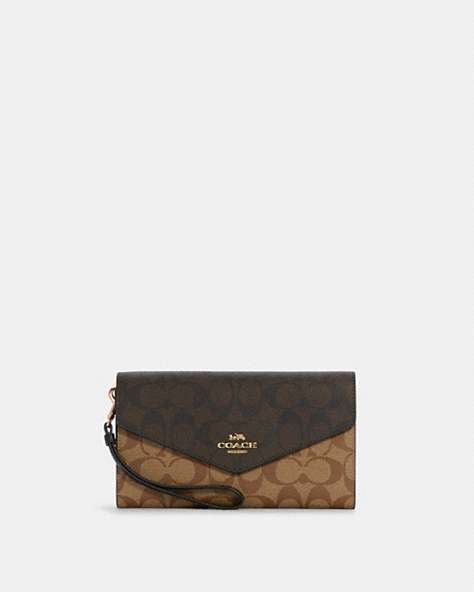 COACH®,TRAVEL ENVELOPE WALLET IN BLOCKED SIGNATURE CANVAS,Signature Coated Canvas,Gold/Khaki Brown Multi,Front View