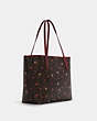 COACH®,CITY TOTE IN SIGNATURE CANVAS WITH HEART PETAL PRINT,canvas,X-Large,Gold/Brown Multi,Angle View