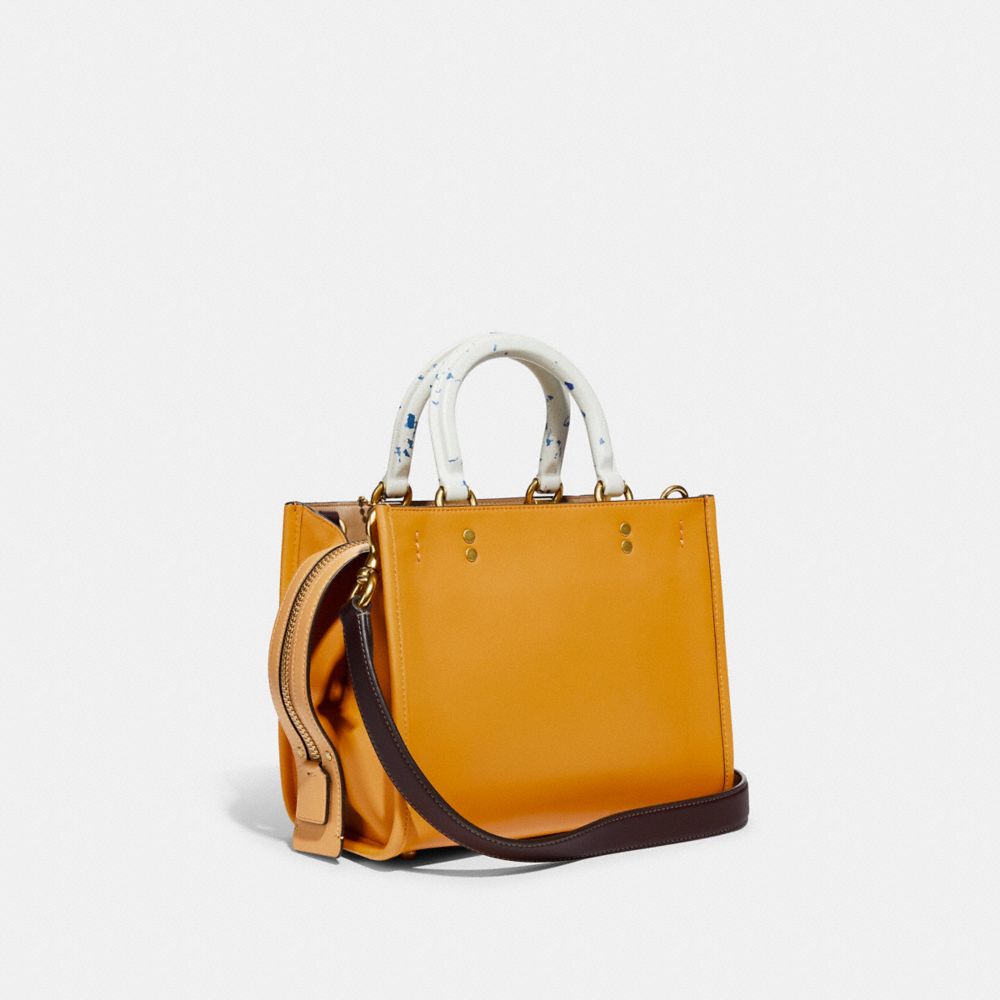 COACH®,ROGUE BAG 25 WITH RECYCLED HANDLES,Glovetan Leather,Medium,Brass/Buttercup,Angle View