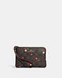 COACH®,CORNER ZIP WRISTLET IN SIGNATURE CANVAS WITH HEART PETAL PRINT,Leather,Mini,Gold/Brown Multi,Front View