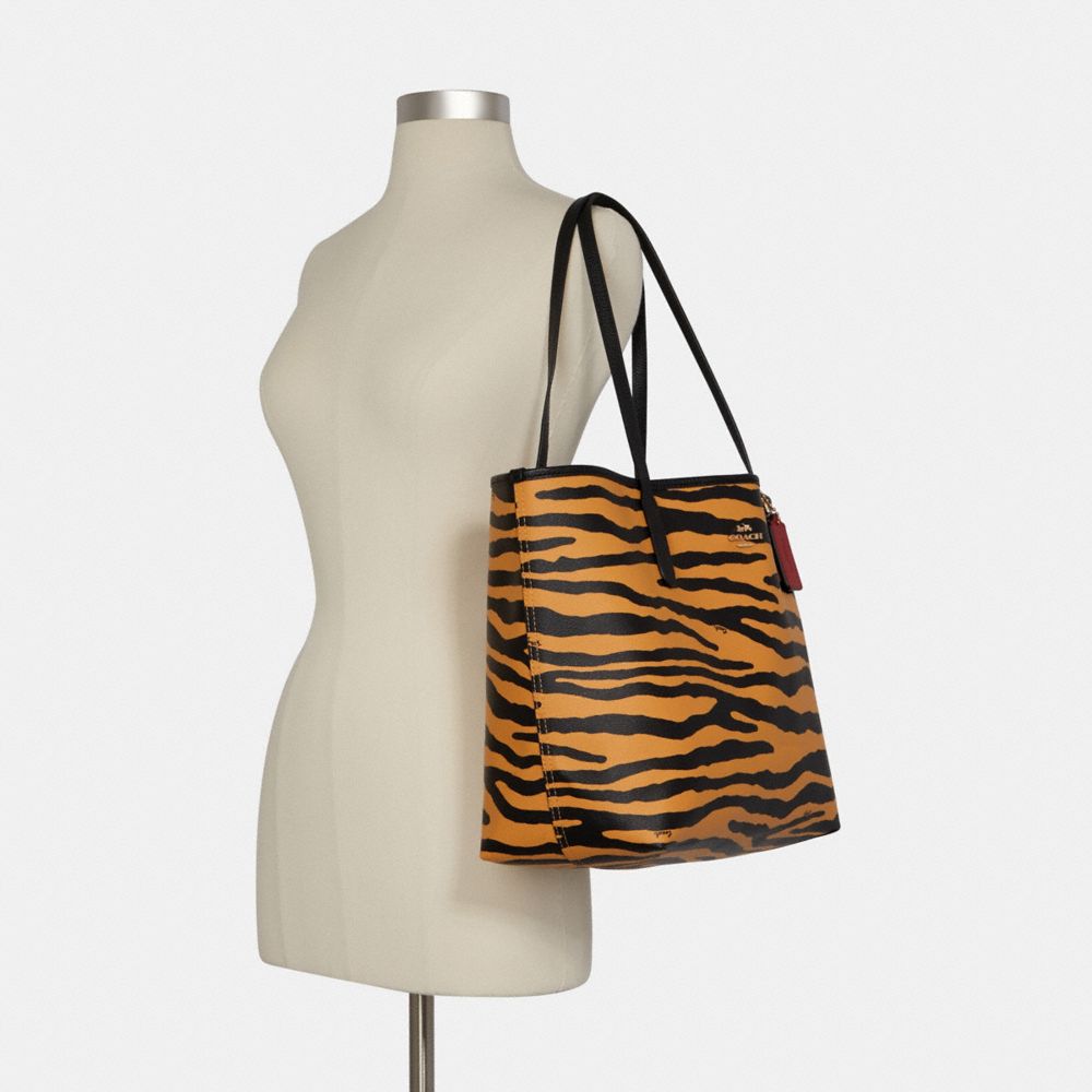 coach city tote with tiger print