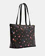 COACH®,GALLERY TOTE BAG WITH DISCO STAR PRINT,X-Large,Gold/Black Multi,Angle View