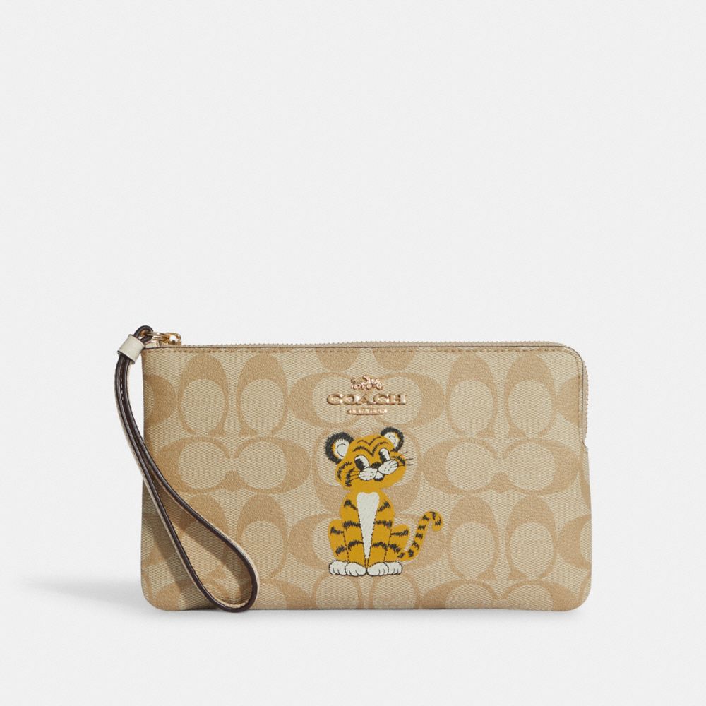 COACH® | Large Corner Zip Wristlet In Signature Canvas With Tiger