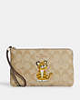 COACH®,LARGE CORNER ZIP WRISTLET IN SIGNATURE CANVAS WITH TIGER,Leather,Mini,Gold/Light Khaki Chalk,Front View