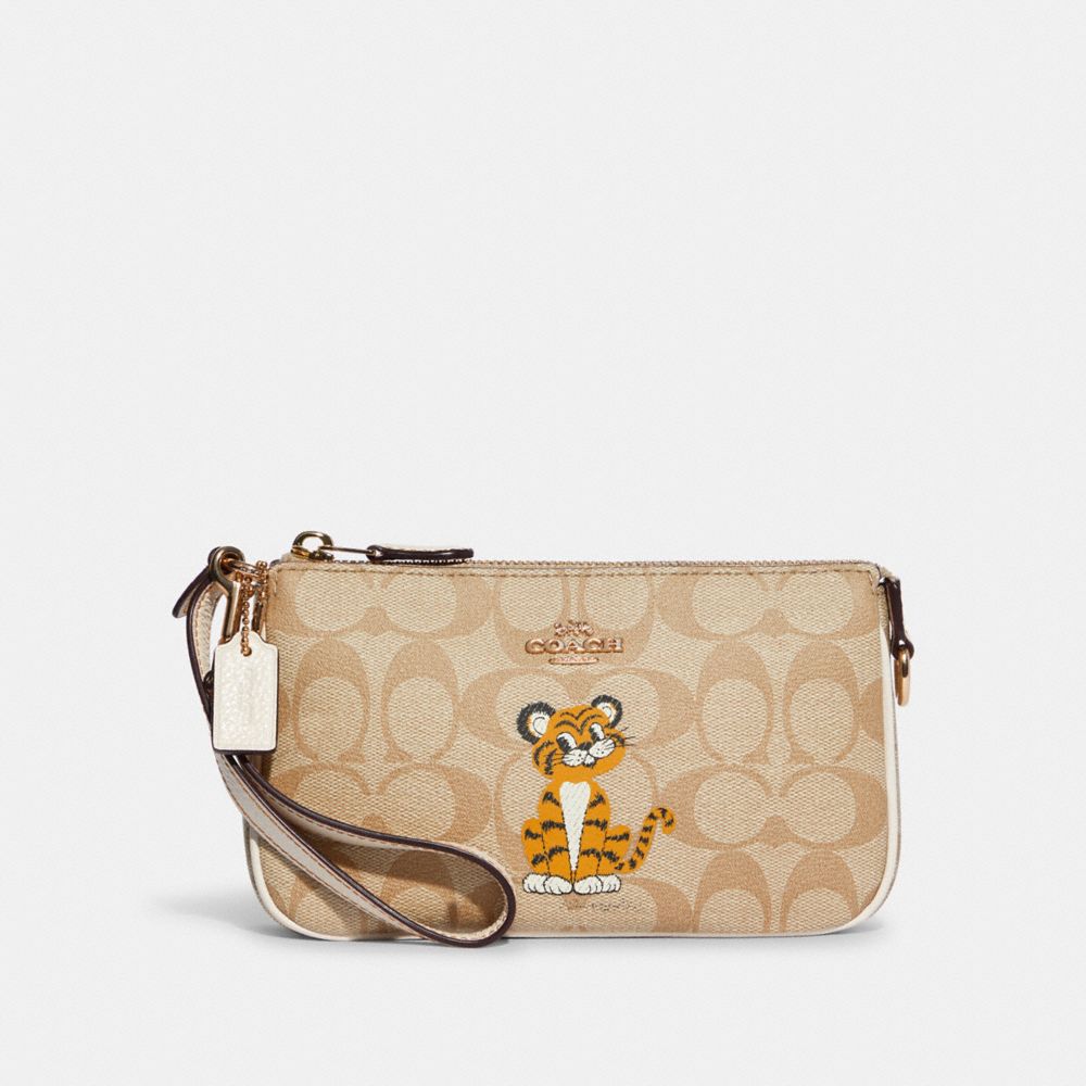 COACH® | Nolita 19 In Signature Canvas With Tiger