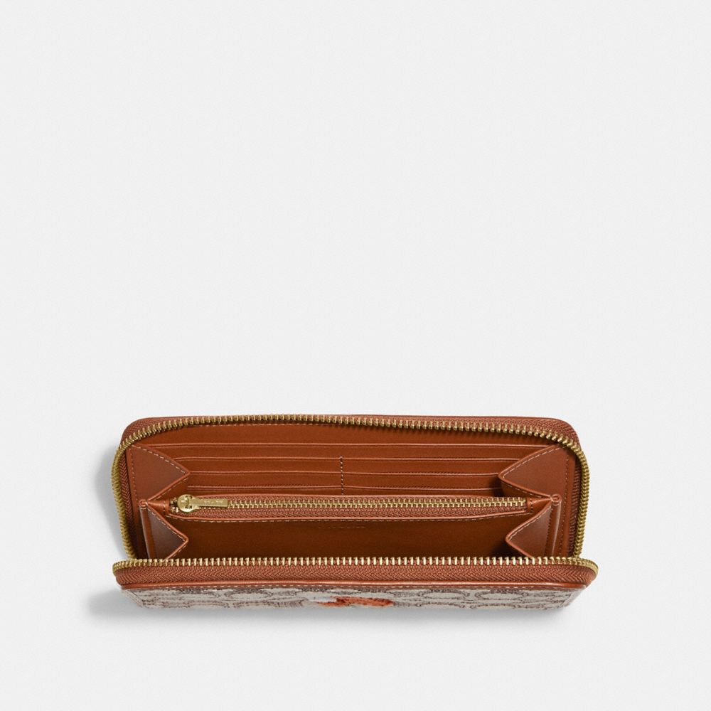 COACH® | Accordion Zip Wallet In Signature Jacquard With Fox Motif