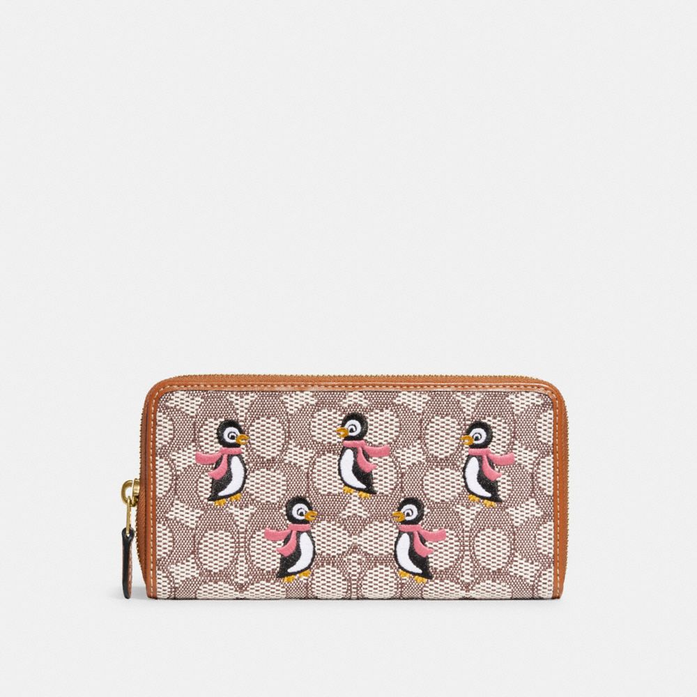 COACH®,ACCORDION ZIP WALLET IN SIGNATURE TEXTILE JACQUARD WITH PENGUIN MOTIF,Mini,Brass/Cocoa Burnished Amb,Front View