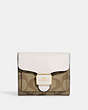 COACH®,PEPPER WALLET IN SIGNATURE CANVAS,Signature Coated Canvas,Gold/Khaki/Chalk,Front View
