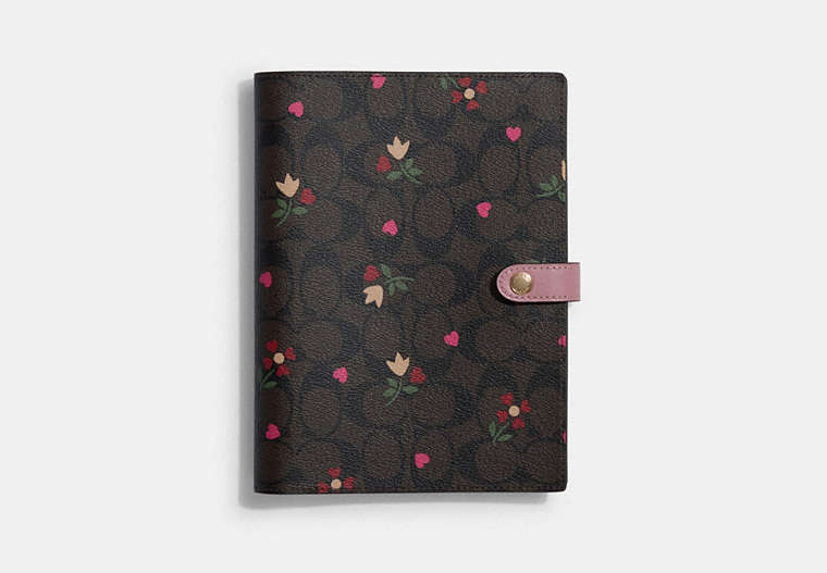 COACH®,NOTEBOOK IN SIGNATURE CANVAS WITH HEART PETAL PRINT,Chestnut True Pink,Front View