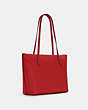 COACH®,ZIP TOP TOTE BAG,Pebbled Leather,Large,Gold/True Red,Angle View