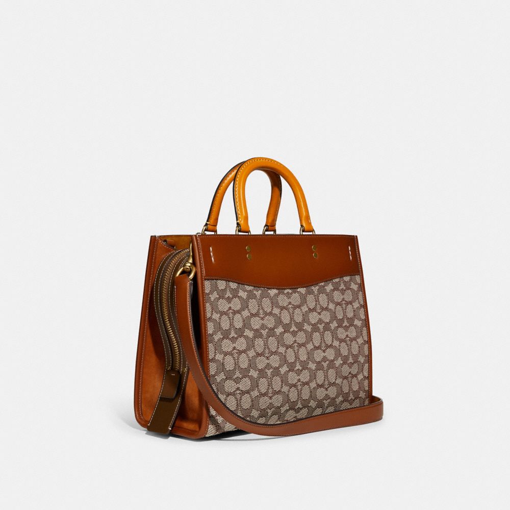 COACH®,ROGUE BAG IN SIGNATURE TEXTILE JACQUARD,Large,Brass/Cocoa Burnished Amb,Angle View