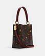 COACH®,SMALL TOWN BUCKET BAG IN SIGNATURE CANVAS WITH HEART PETAL PRINT,Medium,Gold/Brown Multi,Angle View