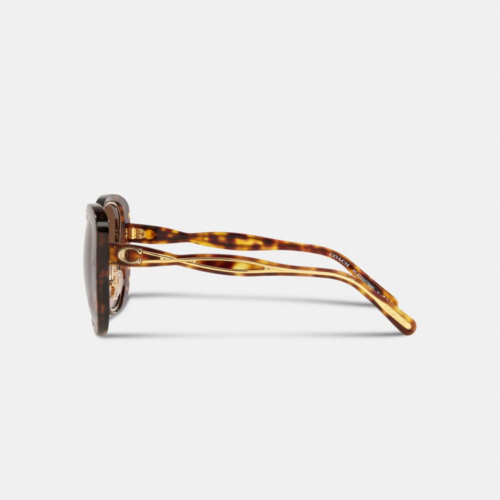 Lunettes de soleil rondes avec signature et gravure