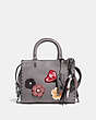 COACH®,UPCRAFTED ROGUE 25 WITH TEA ROSE APPLIQUE AND PATCHES,Smooth Leather,Medium,Pewter/Heather Grey,Front View