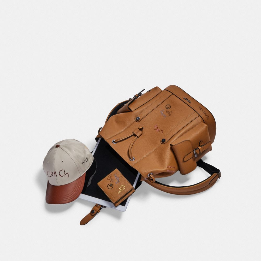 COACH®,Hudson Backpack With Diary Embroidery,,Angle View