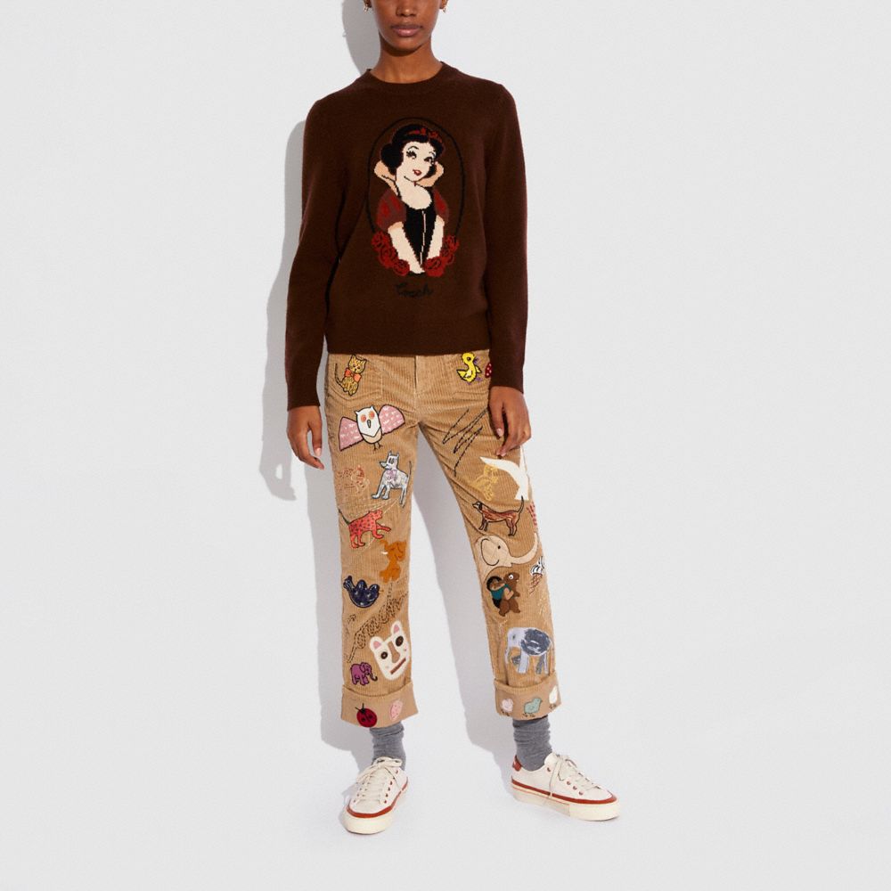 Coach disney clearance sweater