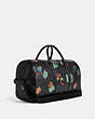 COACH®,VENTURER BAG WITH DREAMY LEAVES PRINT,Leather,X-Large,Gunmetal/Black Multi,Angle View