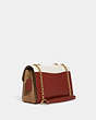 COACH®,LANE SHOULDER BAG IN COLORBLOCK SIGNATURE CANVAS,Coated Canvas/Leather,Large,Gold/Khaki Chalk Multi,Angle View