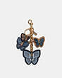 COACH®,BUTTERFLY CLUSTER BAG CHARM,Gold/Denim Multi,Front View