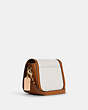 COACH®,SADDLE BAG IN COLORBLOCK WITH HORSE AND CARRIAGE,canvas,Gold/Chalk Multi,Angle View