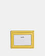 COACH®,SLIM ID CARD CASE IN SIGNATURE JACQUARD,Jacquard,Gunmetal/Retro Yellow,Back View