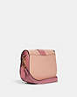 COACH®,GEORGIE SADDLE BAG IN COLORBLOCK,Gold/Faded Blush/Taffy,Angle View