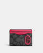 COACH®,MAGNETIC CARD CASE IN COLORBLOCK SIGNATURE CANVAS WITH COACH PATCH,Mini,Gunmetal/Charcoal/Denim Multi,Front View