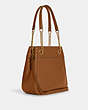COACH®,CAMMIE CHAIN BUCKET BAG,Pebbled Leather,Large,Gold/Penny,Angle View